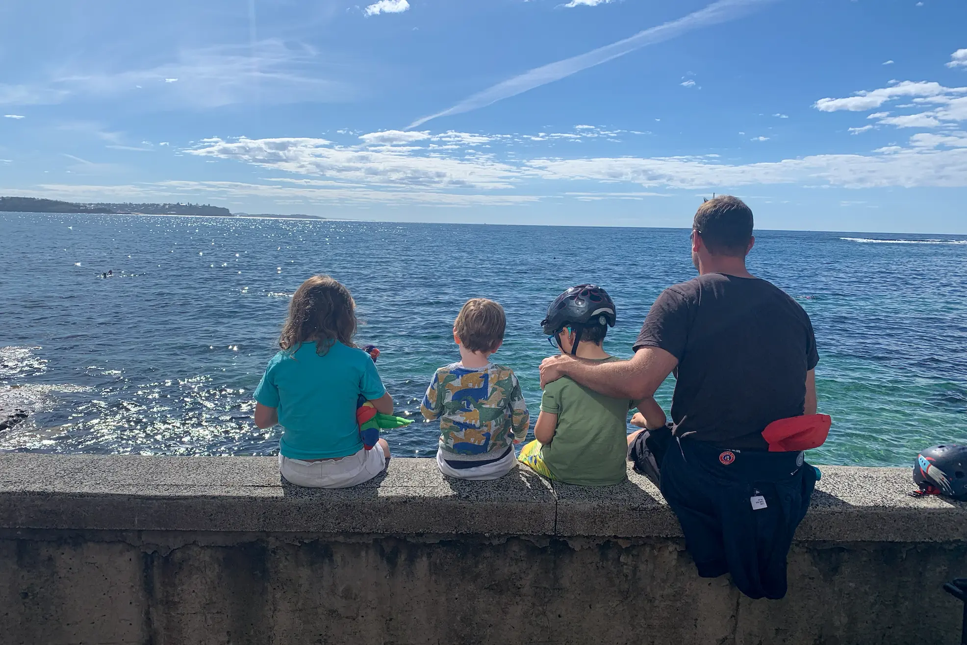 Taking in the ocean as a family.